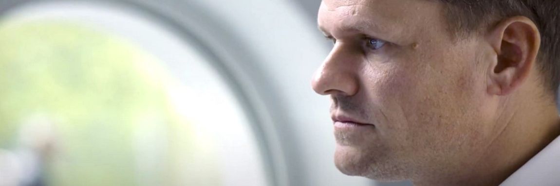 Close-up of engineer focusing intently on his work