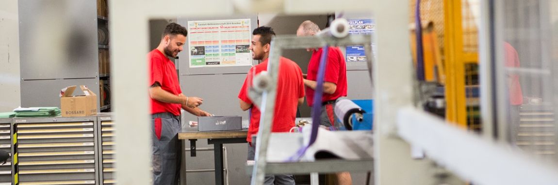 Employees of the global logstics centre working in plant
